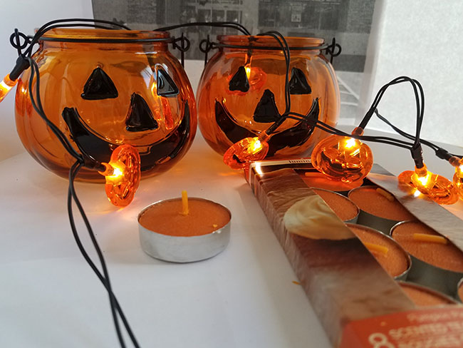 dollar tree candle holders and light up pumpkins