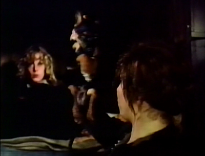 Oh, and there's the part where Slutsister waves the family's drowned puppy at the little kids, then dumps it in the chamberpot. The captions just write themselves on this one.